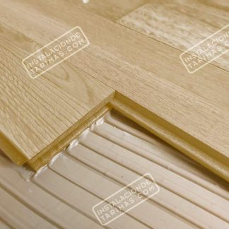 Tarima de roble 100% macizo sin nudo pegada sobre la solera